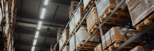Pallet racking stacked with cartons in a distribution warehouse