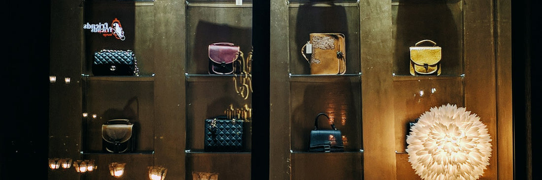 Bags displayed in a retail glass cabinet