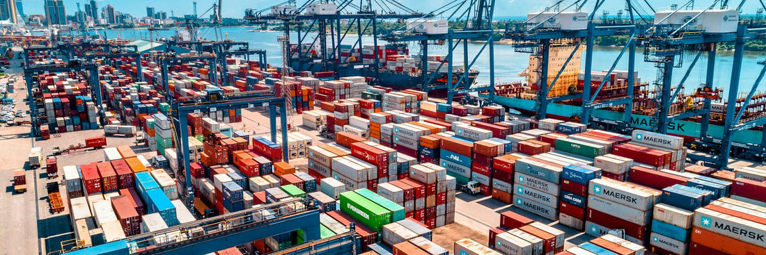Shipping containers stacked at a freight terminal