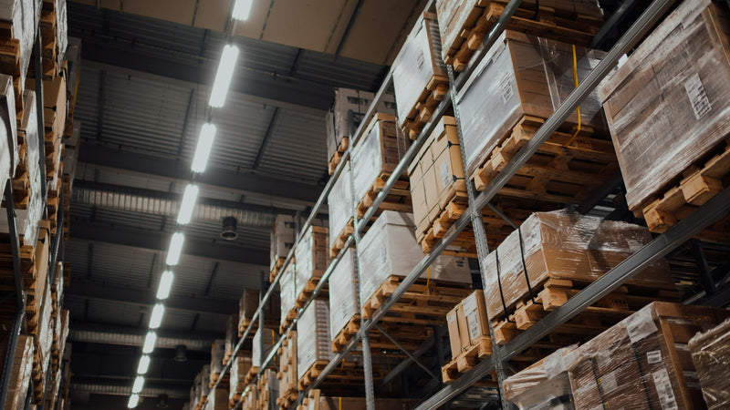 Pallet racking stacked with cartons in a distribution warehouse